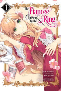 Cover of The Fiancee Chosen by the Ring volume 1. Lady Aurora Porta is lying down with her embroidery supples around her - two spools of thread and a loom with embroidery cloth. She's in her signature pink dress with white lace down the middle on her front. At the top of her bodice is a pink bow. Her blonde hair frames her face. She's looking at us with two green eyes and smiling slightly.