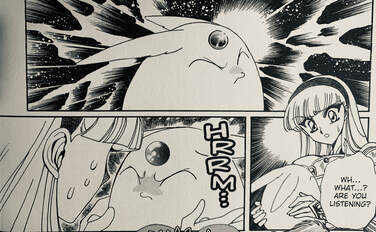 Photo of a few panels in which Mokona has a very furrowed brow