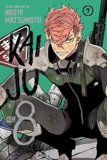 Cover of Kaiju no. 8 volume 7. One of the soldiers from the Defense Force is crouching on top of an armored piece of equipment. Behind him is a large gun. He is smiling devilishly. 