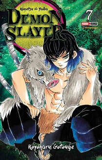 Cover of Demon Slayer volume 7. Here is a rare glance of Inosuke without his wild boar helmet on. He has it by his side, and he stares slightly off frame with his piercing blue eyes. His black hair with blue tips frames his face. We can also see is chiseled 6-pack abs peaking through the layer of boar fir he wears.