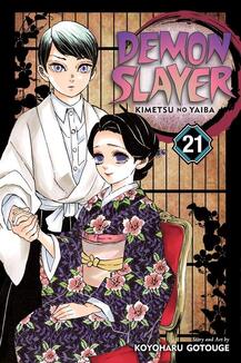 Cover of Demon Slayer volume 21. A demon in a white coat is holding the hand of a demon sitting in a chair. She's in a flower kimono that has pink flowers and purple fabric. It has a pink ribbon around her midsection. 