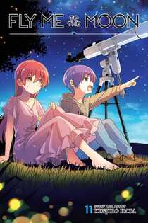 Cover of Fly Me to the Moon volume 11. Tsukasa and Nasa are sitting in a grassy field with a telescope behind Nasa. It's twilight as there are some stars visible above them, but a light blue sky just above the horizon. Tsukasa is in a pink dress, while Nasa is in a brown hoodie and blue jeans.