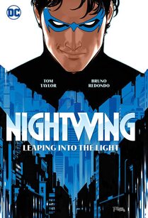 Cover of Nightwing volume 1. Nightwing stands facing us with a smirk on his face. The blue nightwing emblem and the bottom part of his suit are also shaped to look like the city skyline of Blüdhaven.