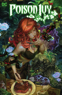 Cover of Poison Ivy volume 1. Iviy is cutting into a steak with a knife. She's wearing a black bra. All around her are flowers and plants. Her flaming red hair stands out against the green backdrop.